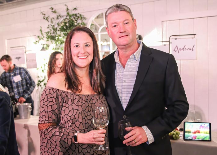Couple holding wine glasses